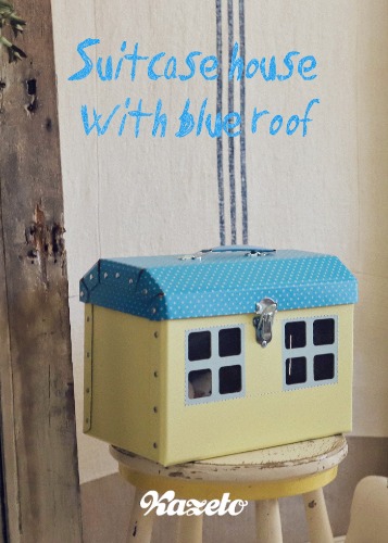 KAZETO Suitcase house with blue roof